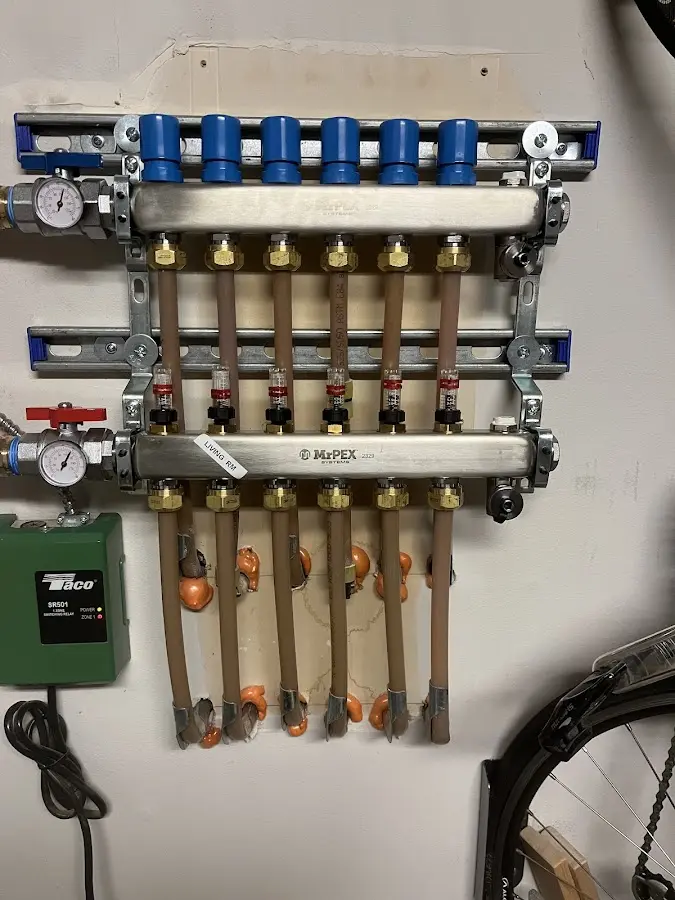 Plumber performing Water Heater Repair at a residential property in Paupack